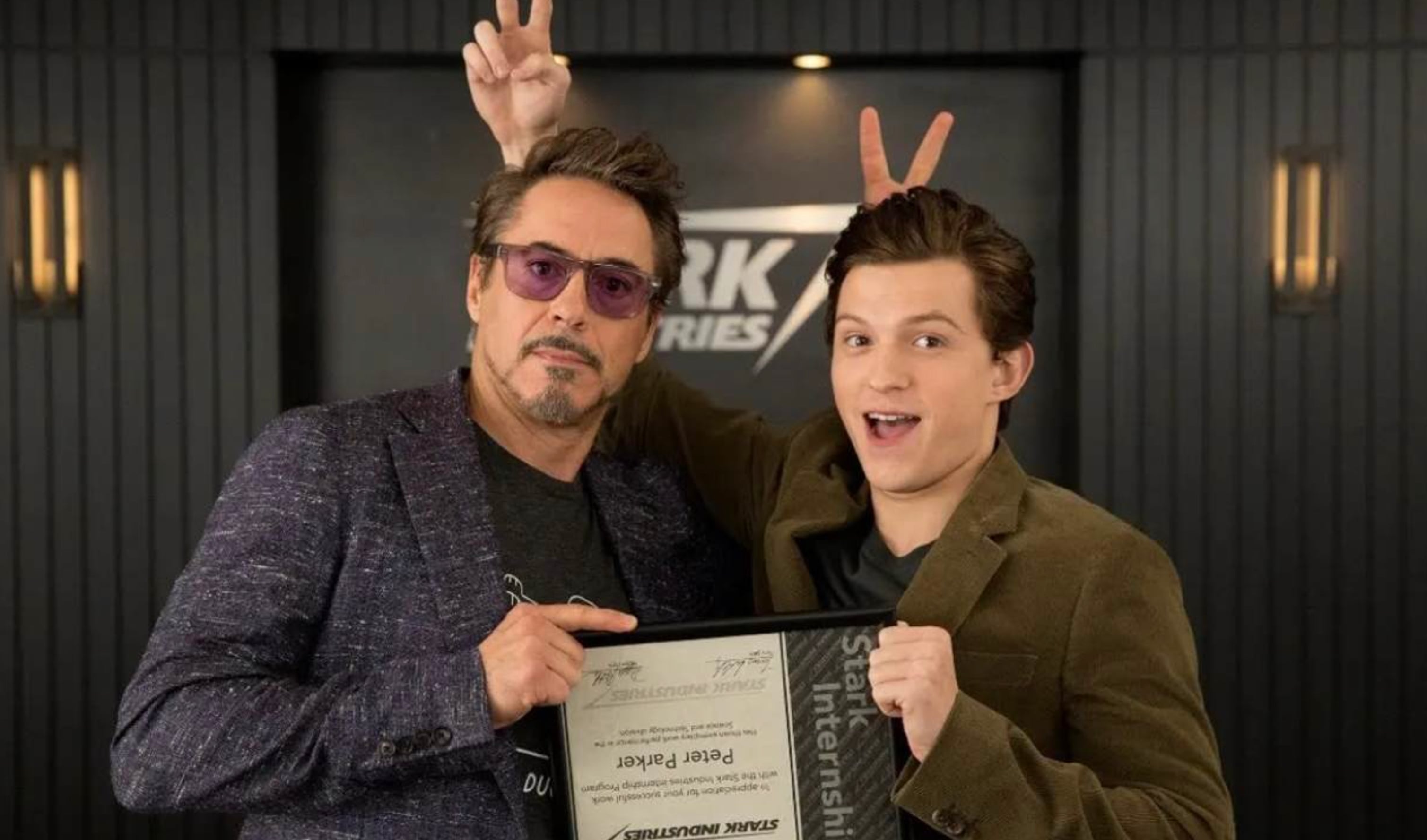 An image of Robert Downey Jr. and Tom Holland as Tony Stark and Peter Parker