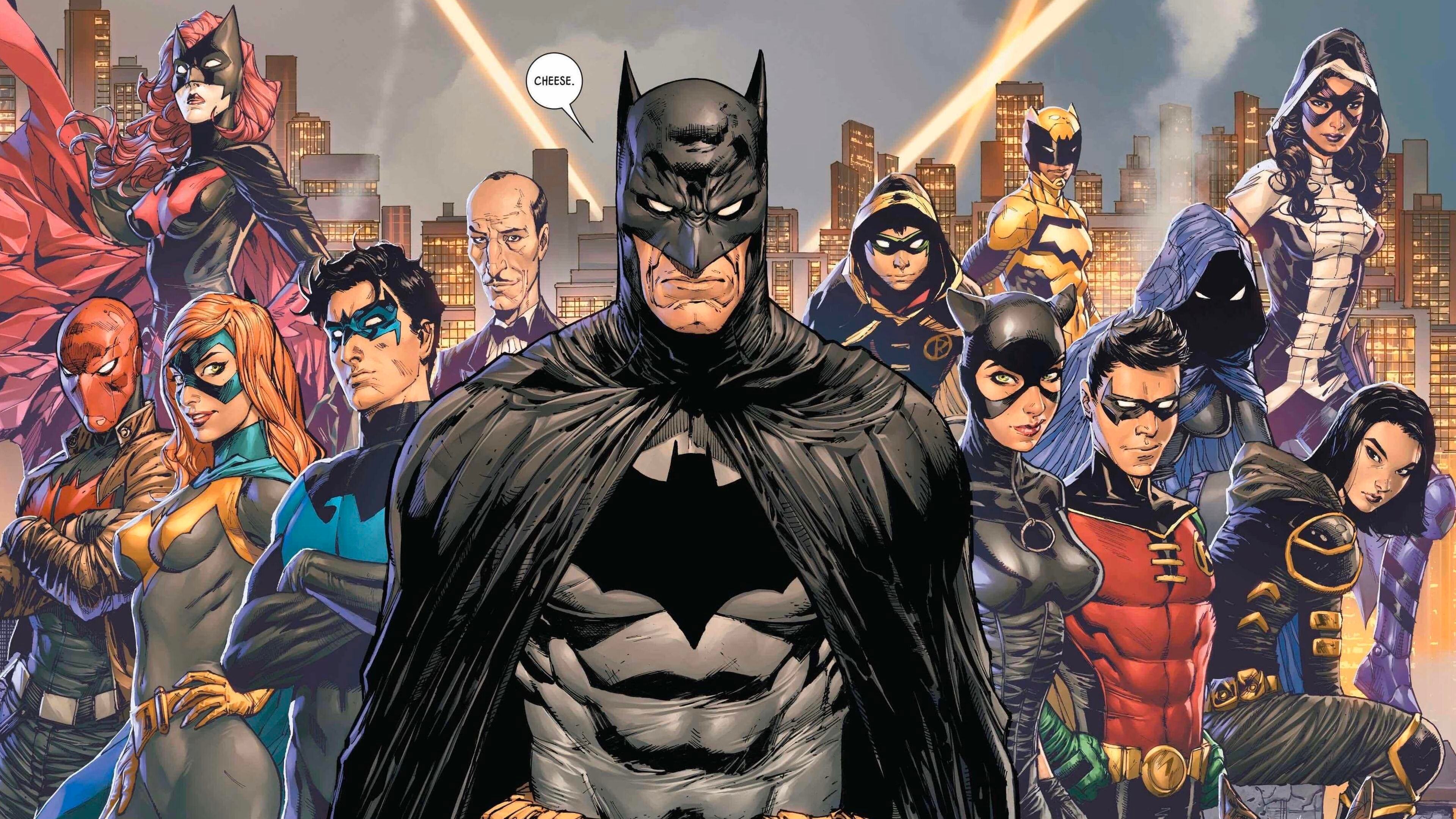 Batman says cheese for the posing Bat-family