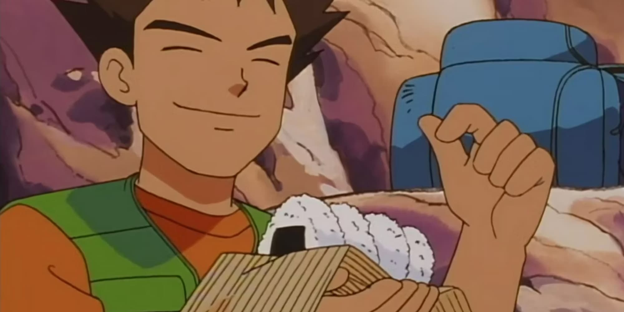 Brock eating a rice ball in Pokemon