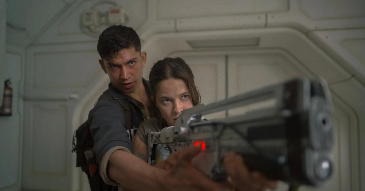 A still from Alien: Romulus of Cailee Spaeny and Archie Renaux.