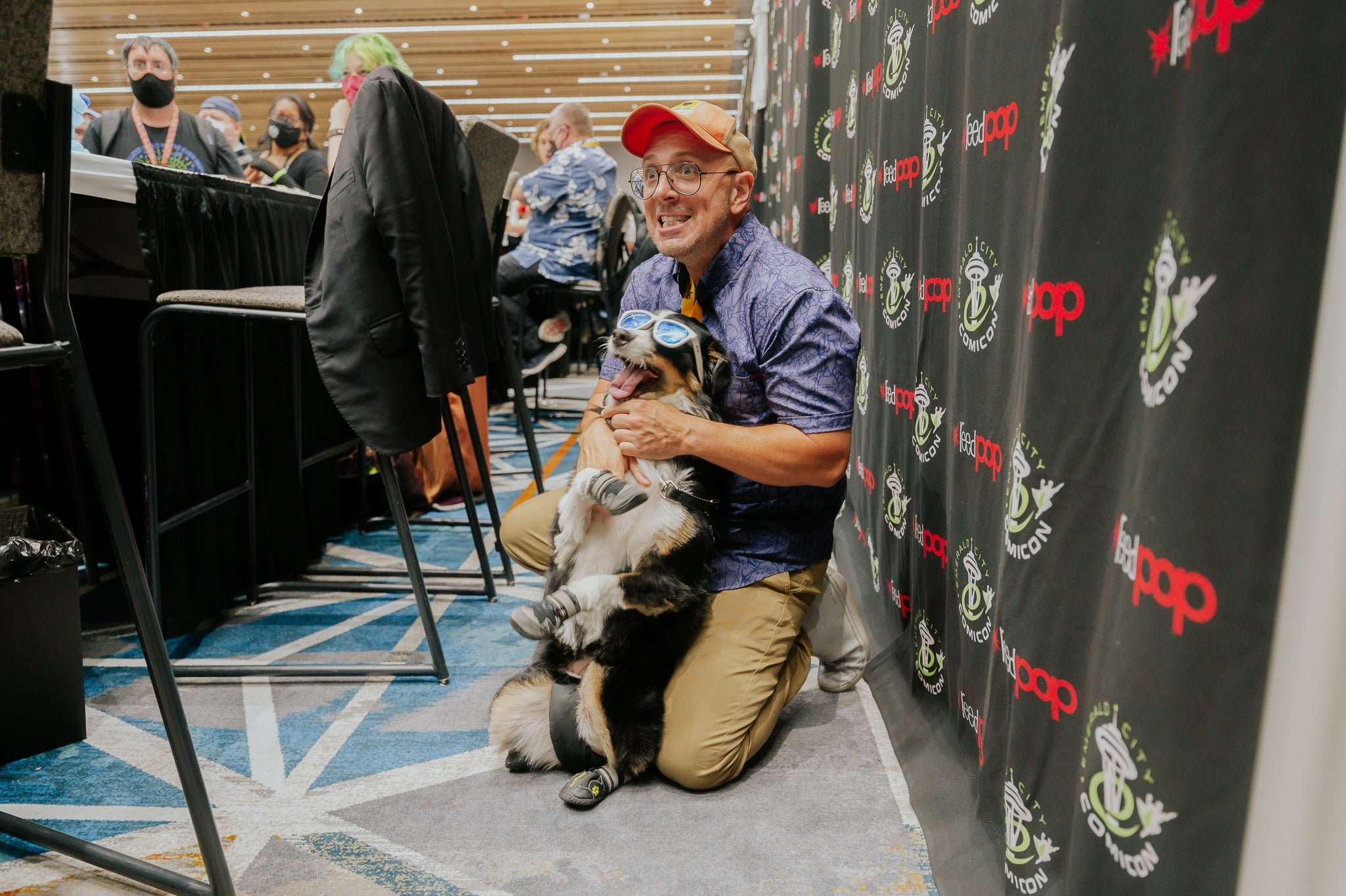 Steve Burns playing with a dog at ECCC