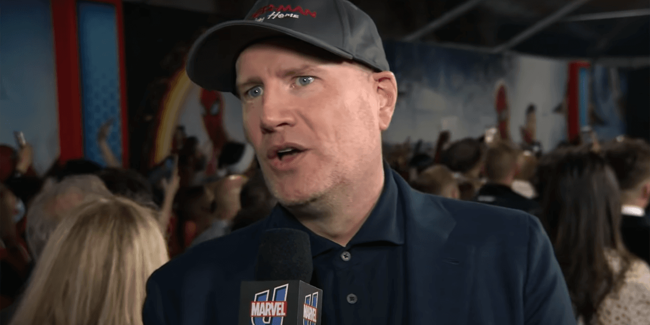 A man talking into a microphone. Kevin Feige at the premiere of Spider-Man: No Way Home