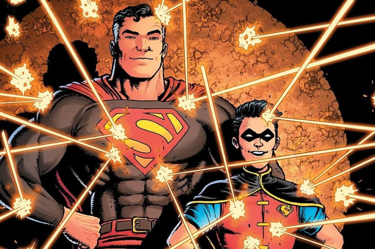 Cropped image of Dark Crisis Superman, featuring an aged Superman standing side by side with Jonathan Kent in a Robin-esque costume