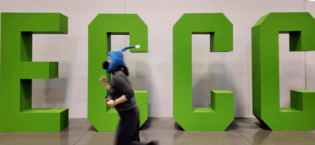 Tiffany Babb wearing a Pikmin hat running across ECCC  letters