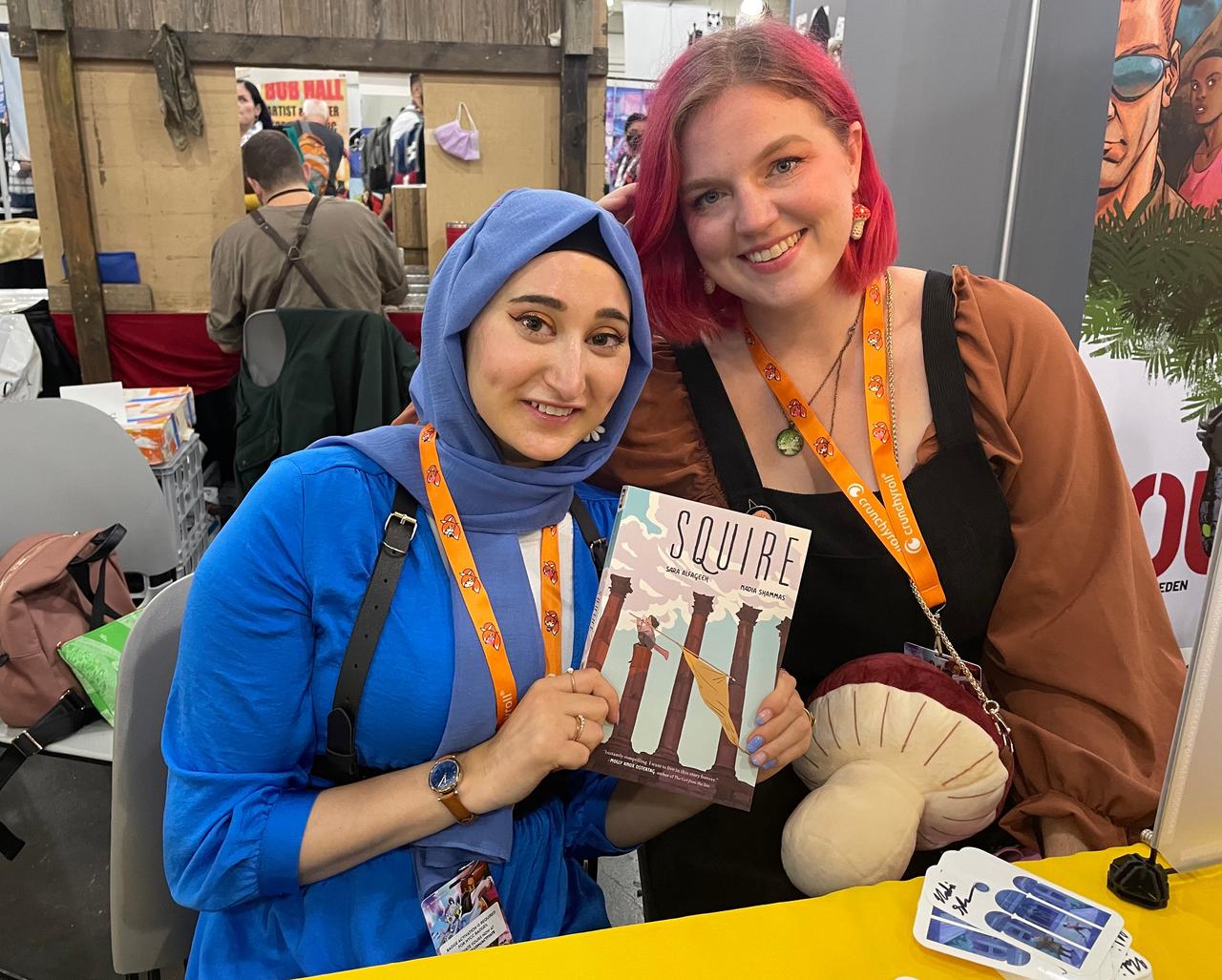 Sara Alfageeh and  Megan McCurdy with Sara and Nadia Shammas' Harvey Award winning Squire