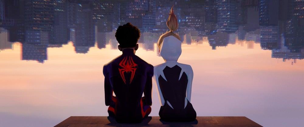 Still animated image featuring Miles Morales and Gwen Stacy sitting upside down looking at the New York City skyline