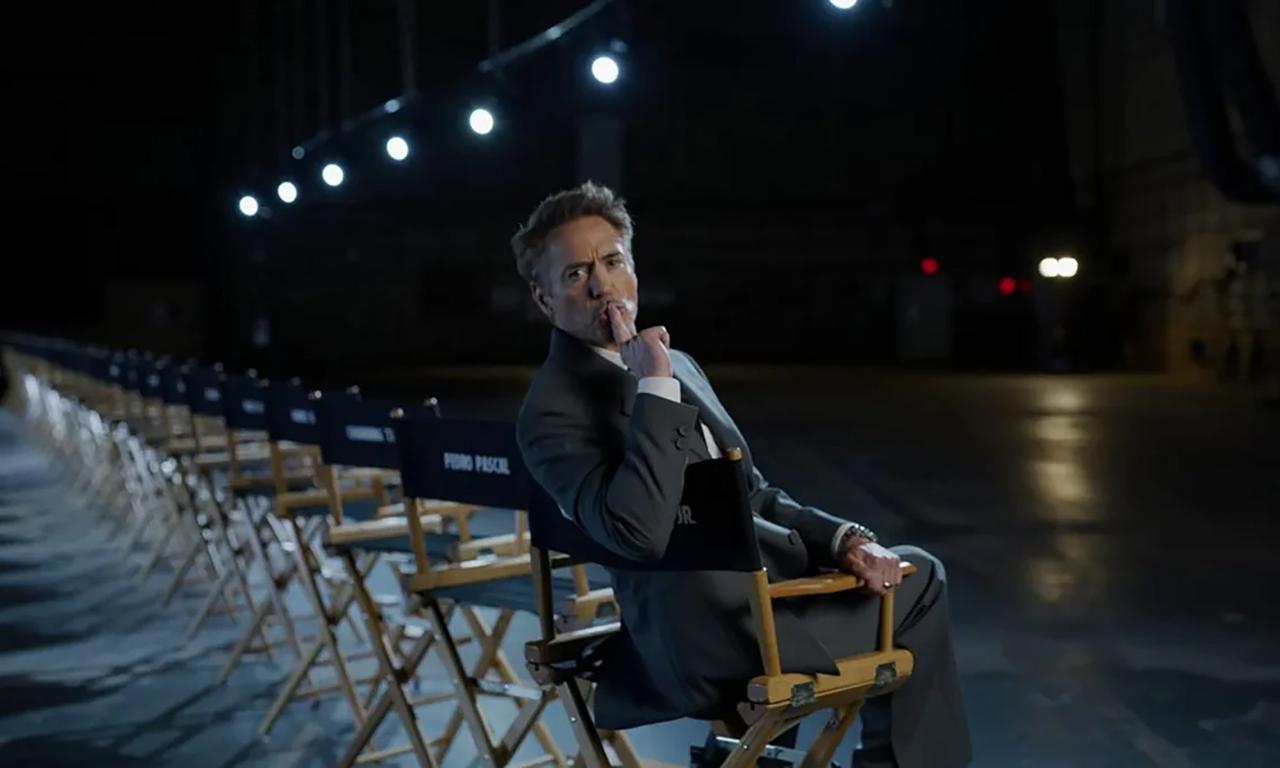 Robert Downey Jr. sitting in a chair at the end of the Marvel's Avengers: Doomsday livestream
